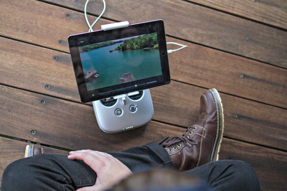 Parker Byrd on Unsplash person sitting on floor watching tv on a tablet