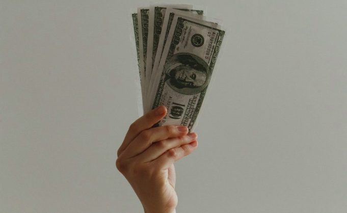person holding money
