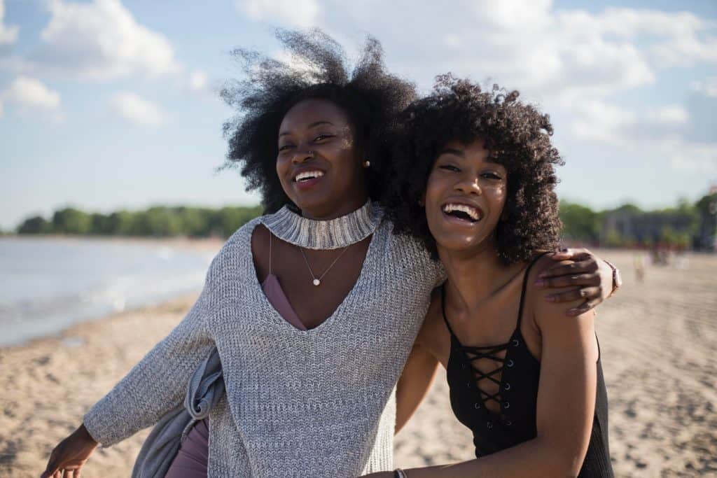 Two sisters having a great day on the beach