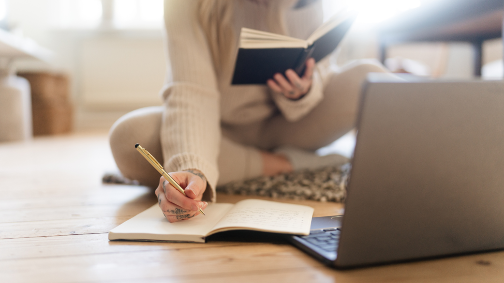 A girl sitting and doing some business research