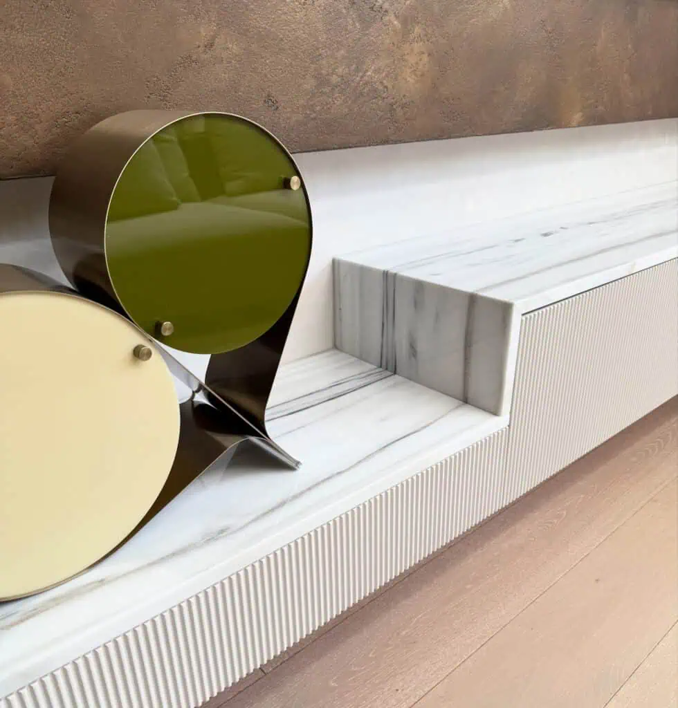 Contemporary interior design featuring sleek storage and marble details at Kew residence.