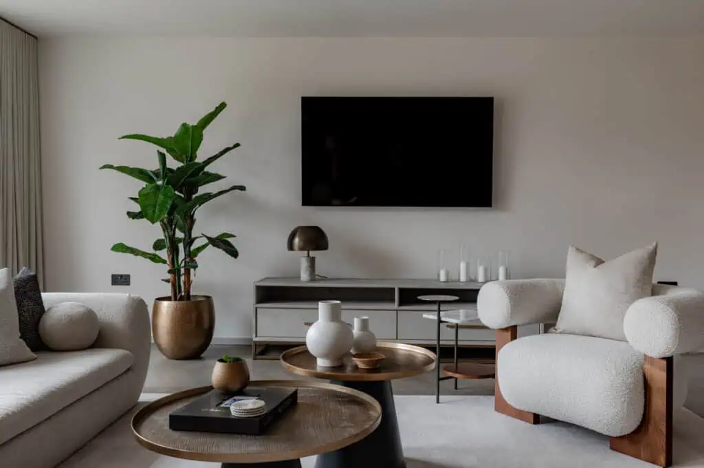 Contemporary Wimbledon living room with minimalist design and neutral tones.