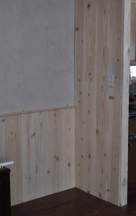 wood paneling makeover - aged plaster treatment