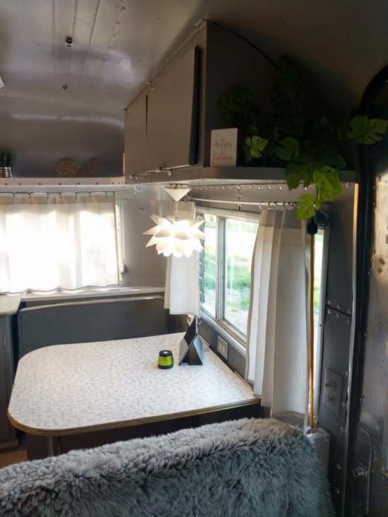 Vintage Camper Restoration - 1962 Streamline Dutchess - Interior After - close up dining area