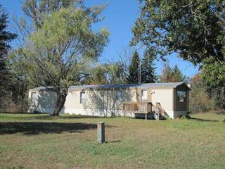 1989 single wide sitting on 20 acres in Wisconsin - how one family survived the housing collapse - second chance at homeownership 