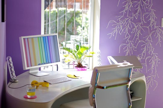 19 Great Home Office Ideas for Small Mobile Homes - a curved corner desk creates purple perfection 