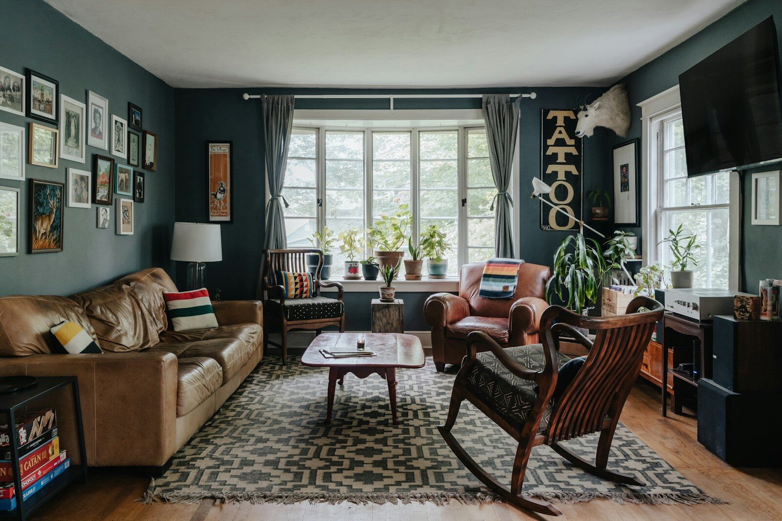 A living room filled with furniture and a flat screen TV