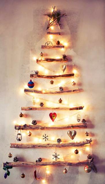 Christmas Tree made from tree branched hung on wall - Affordable DIY Christmas Decor