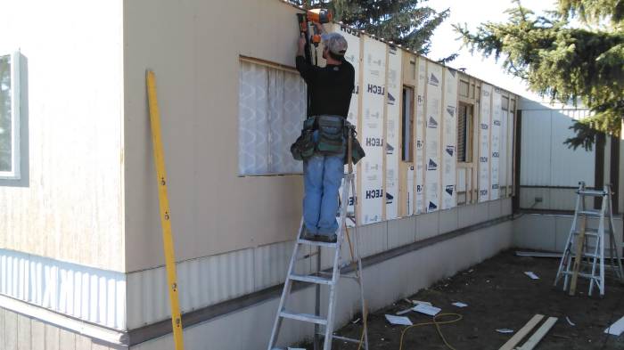 1979 single wide remodel - -installing new siding on mobile home