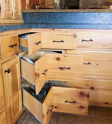 Down-home-on-the-range-corner drawer in cabin kitchen_c