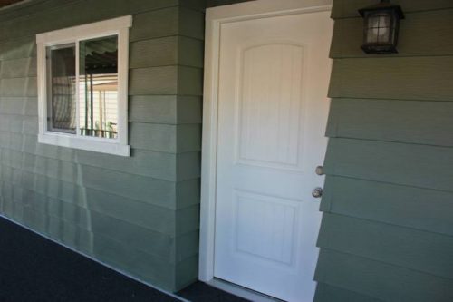Replacing Mobile Home Windows - Exterior of a double wide with new windows