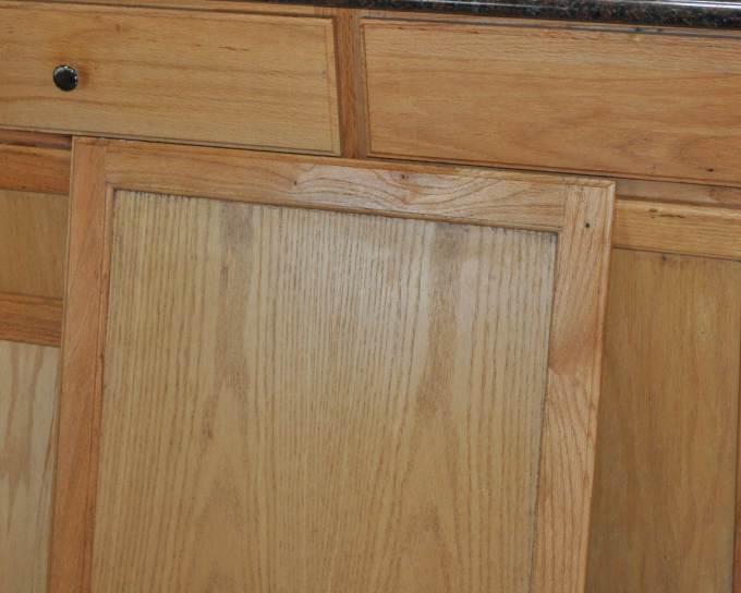 Generic kitchen cabinetry before mobile home kitchen makeover