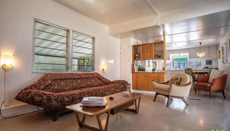 1962 Skyline single wide is a Vintage Mobile Home Beauty - natural wood builtin in living room