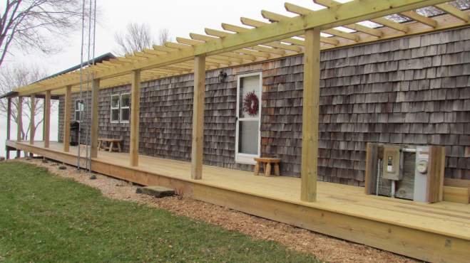single wide exterior remodel - decking, roofing,