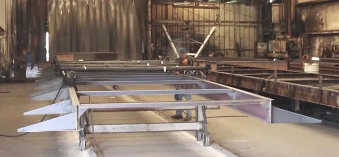 Steel chassis with outriggers in palm harbor facotry