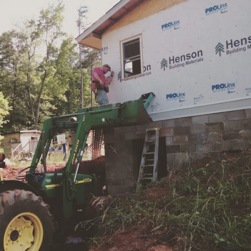 adding an addition to your house - installing siding onto the manufactured home addition