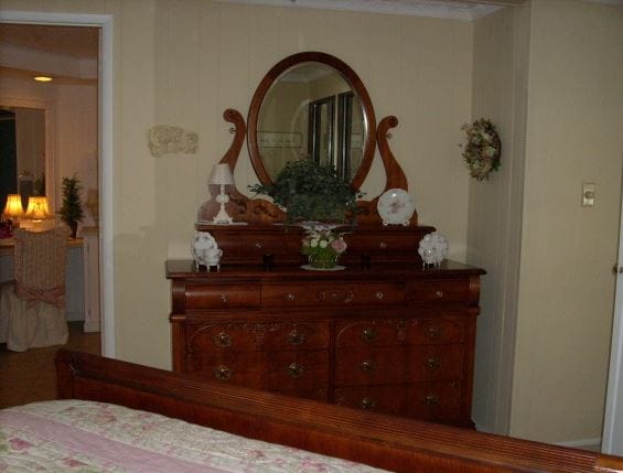 beautiful cottage style master bedroom in a manufactured home