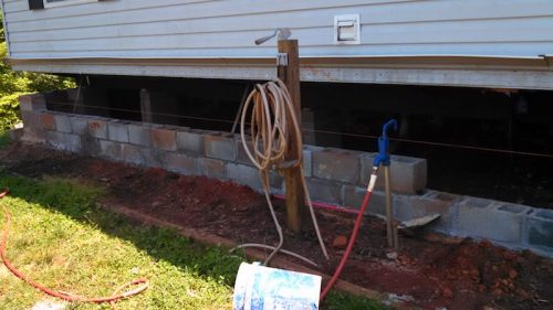 building a two-story addition onto a manufactured home - the home was set onto a basement too