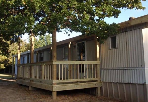 buiulding a self supporting mobile home roof over railing and headers