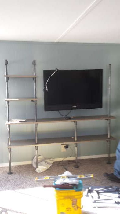1968 DIY mobile home transformation - building a plumbing pipe entertainment center - during