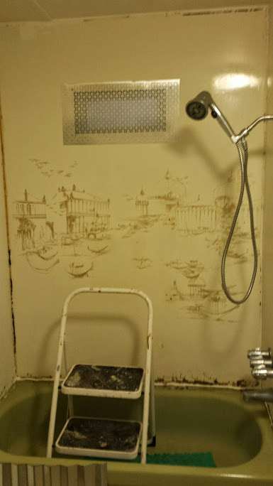 DIY mobile home transformation - sheet metal shower - before