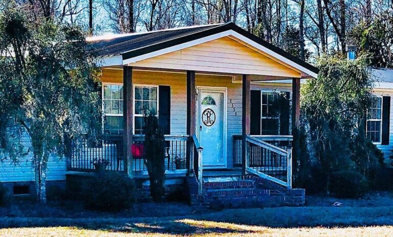 double wide manufactured home with traditional pitched front porch00002