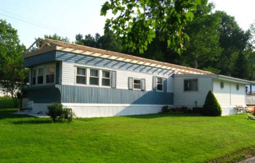 flat to peaked mobile home roof over with no posts framing