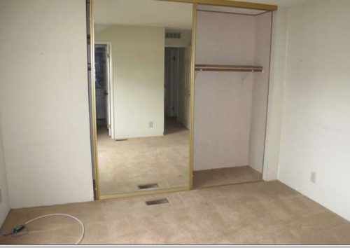beach themed mobile home transformation-bedroom before