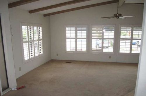 beach themed mobile home transformation-family room before