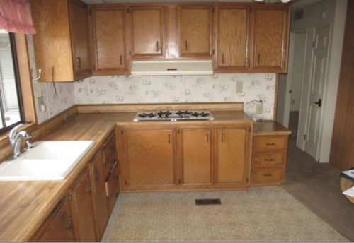beach themed mobile home transformation-kitchen before