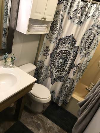 open floor plan in a single wide remodel-guest bath