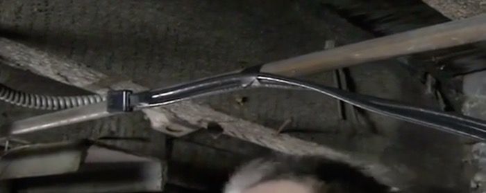 running heat tape flat against water line