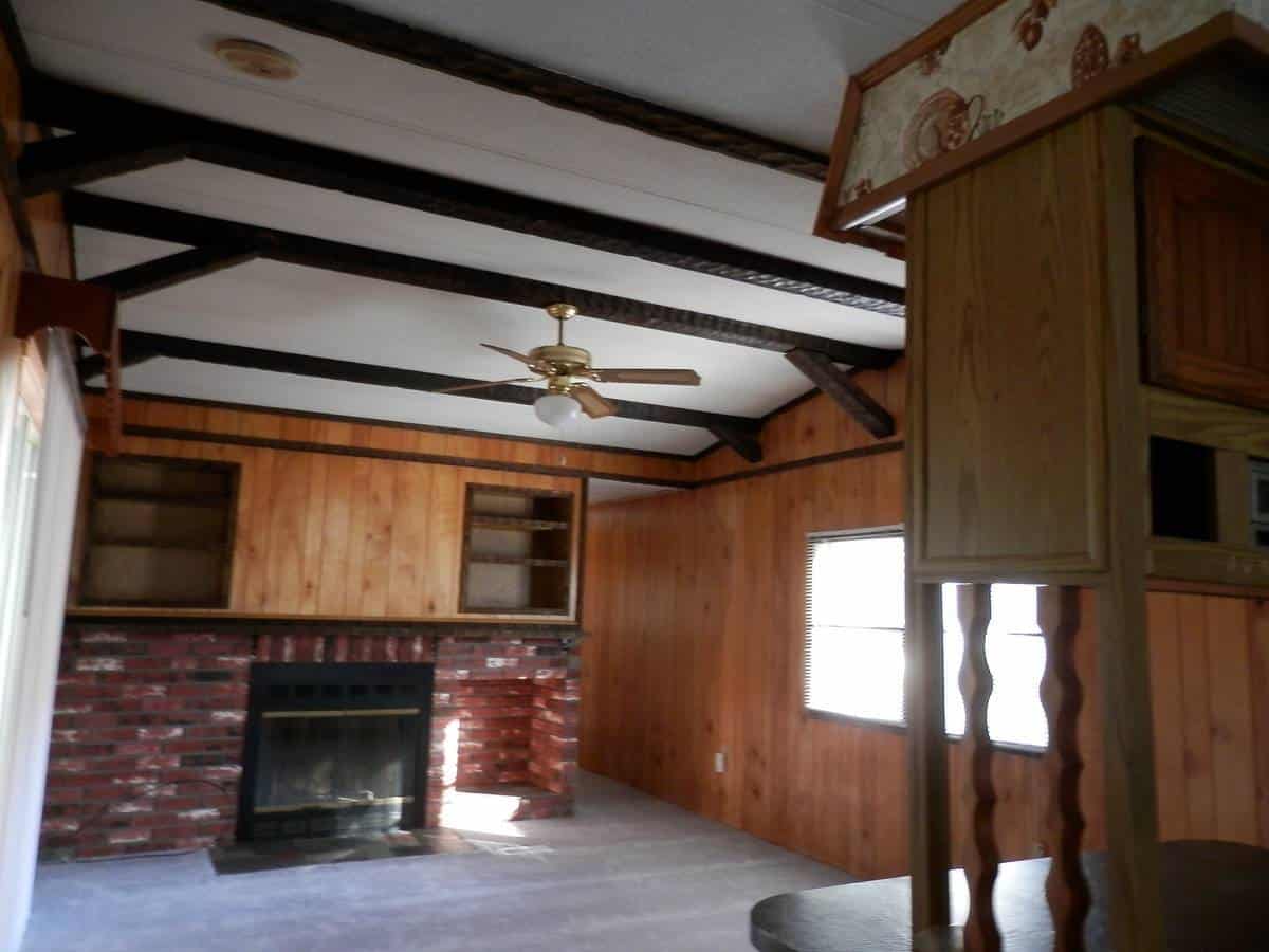 rustic wood beams on a mobile home ceiling
