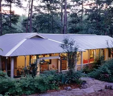 single wide with completed construction on porch