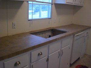 double wide manufactured home makeover - kitchen counter tops tiled with stone tile