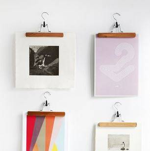 use clothes hangers to hang diy wall art