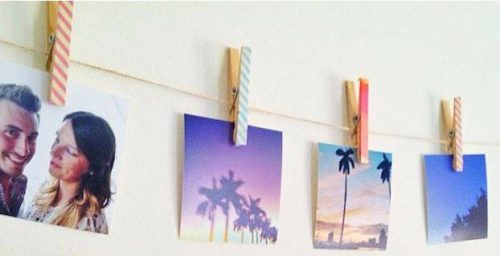 use clotheslines and clothes pins to hang diy wall art