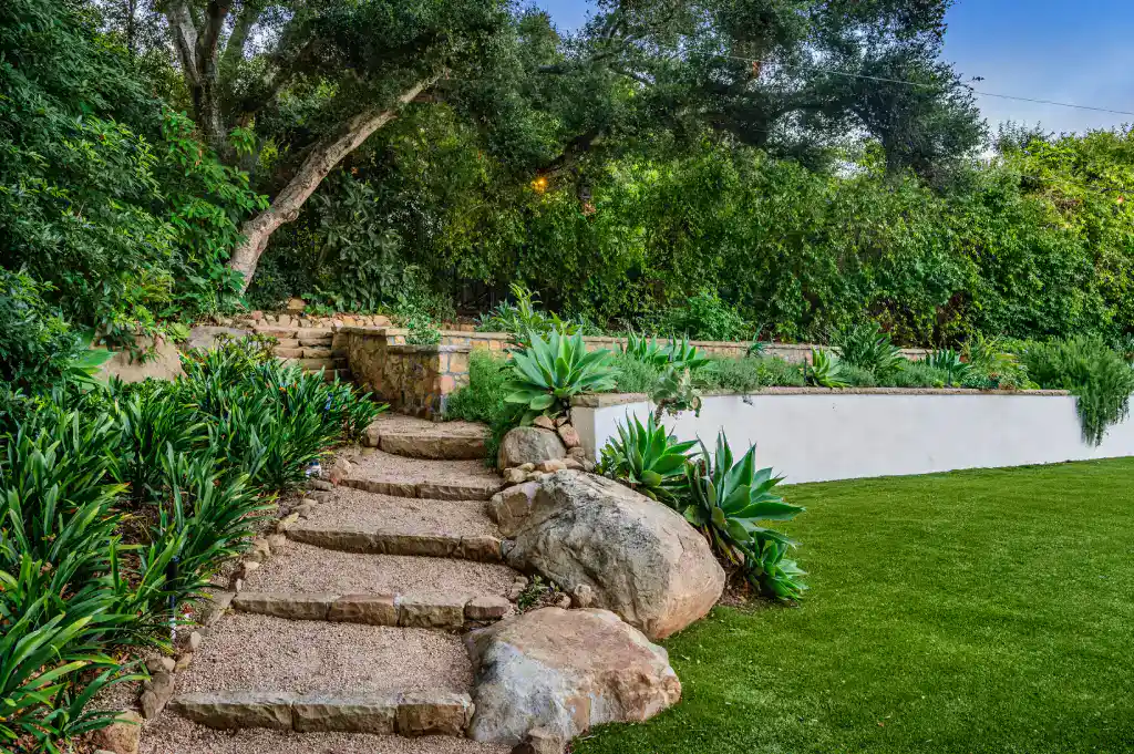 A Small Path Between Two Lawns With Large Boulders 2026 01 08 00 24 53 Utc