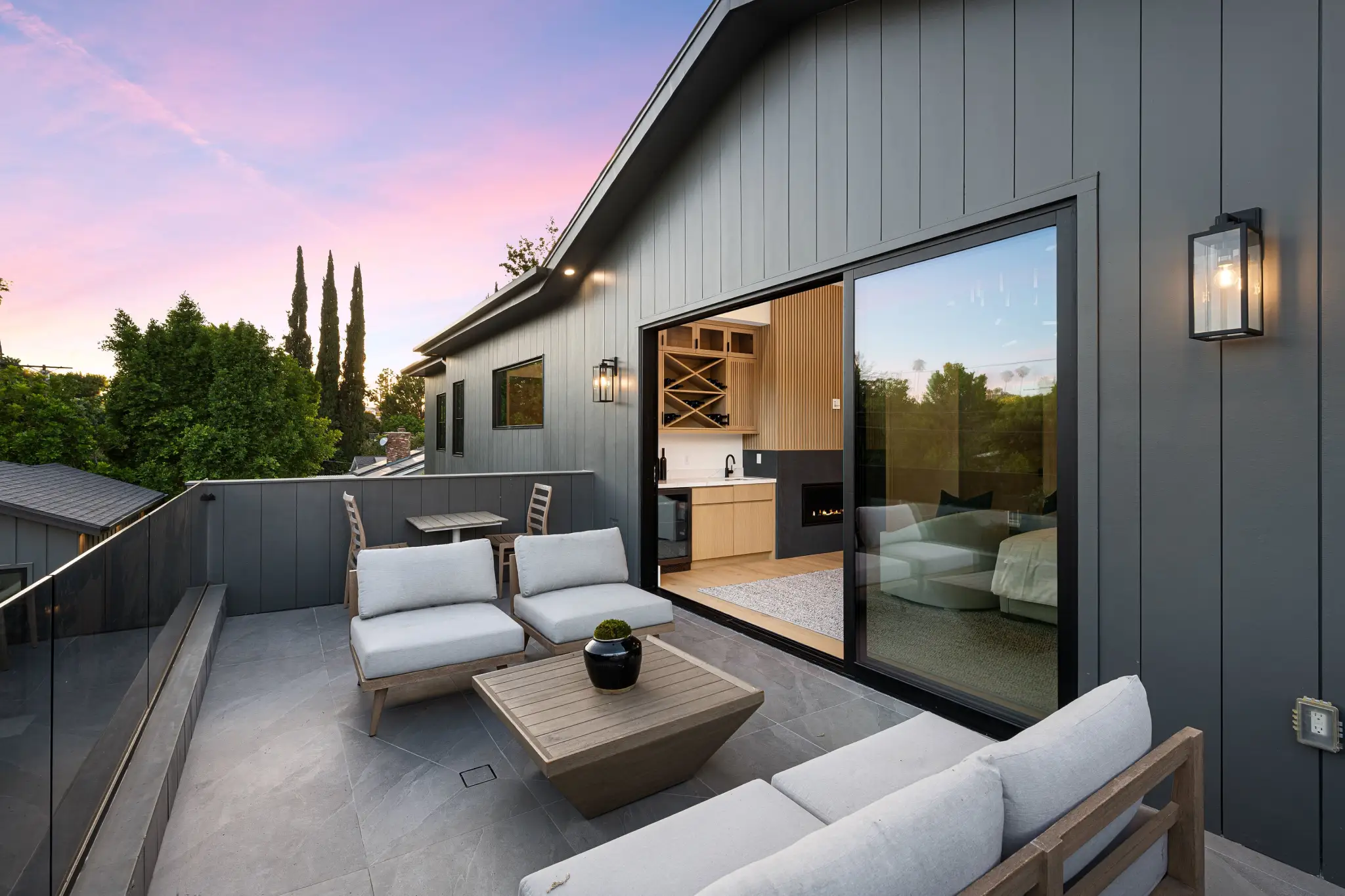 Decks And Patios Modern Outdoor Patio With Seating And Glass Railin 2026 01 07 23 11 32 Utc