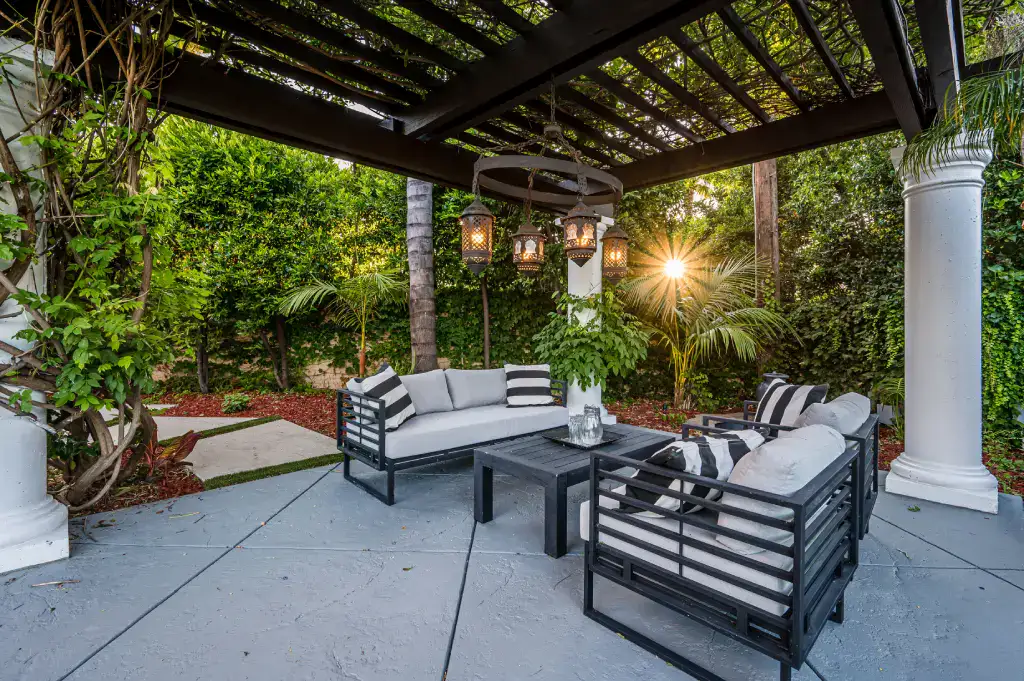 Decks And Patios Patio With White Couches And Chairs In A Modern Ne 2026 01 07 07 13 36 Utc