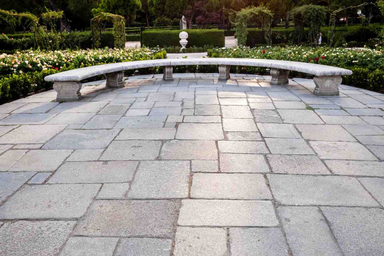 stone-bench-to-rest-in-a-garden-at-sunset-2026-01-05-06-25-20-utc (1)