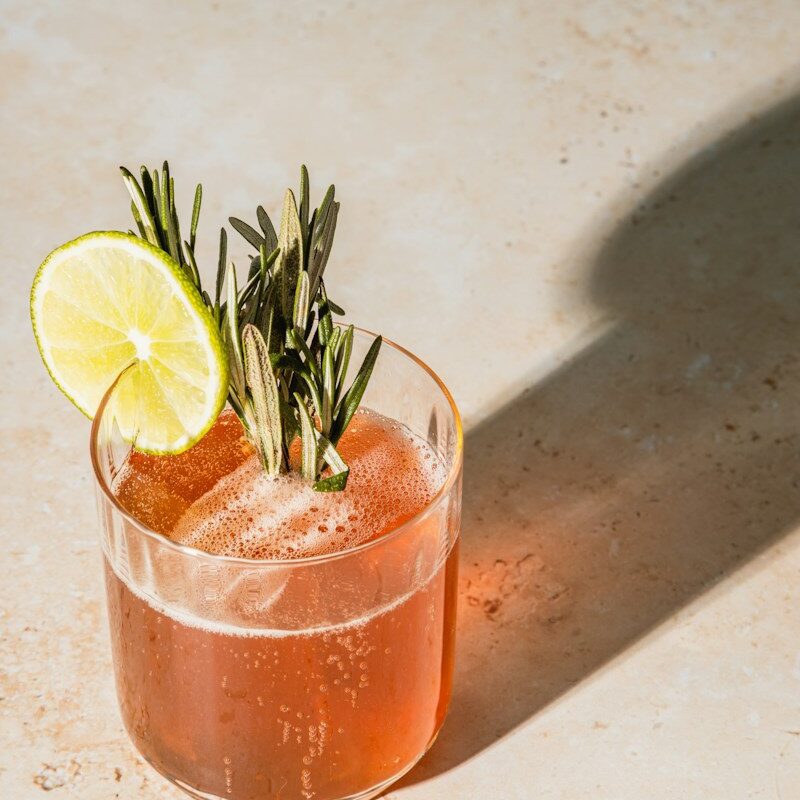 clear drinking glass with orange juice