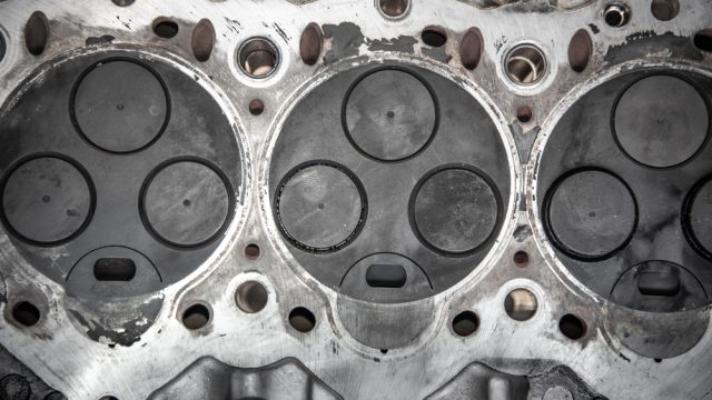 Head removed from the engine with visible three valves