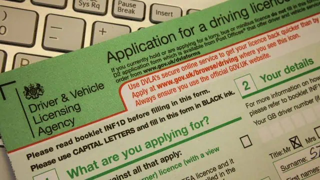 Closeup above application for a driving licence on the table.