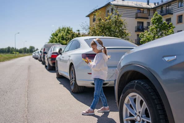 Children walking near a road over the UK Bank Holiday weekend