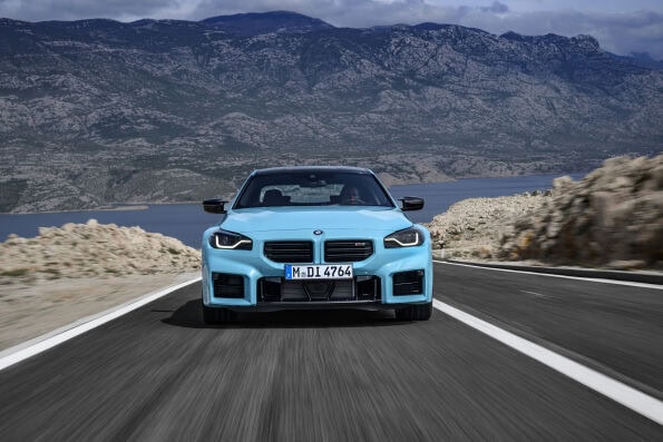 BMW M2 with M xDrive cornering on a circuit