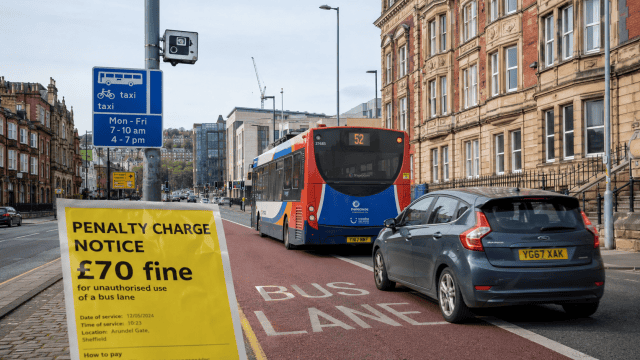 Bus lane speed camera with bus and following car. Penalty-charge-in-Sheffield-bus-lane-alert.