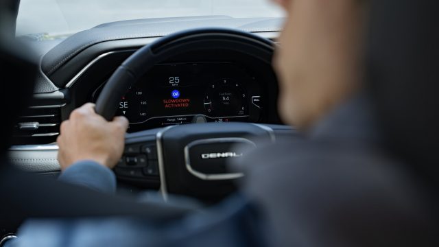 GMC Denali dashboard showing OnStar Stolen Vehicle Slowdown activated