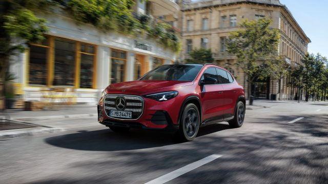 All-new Mercedes-Benz GLA driving through a European city street