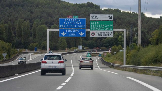 Car approaching French toll booth on motorway